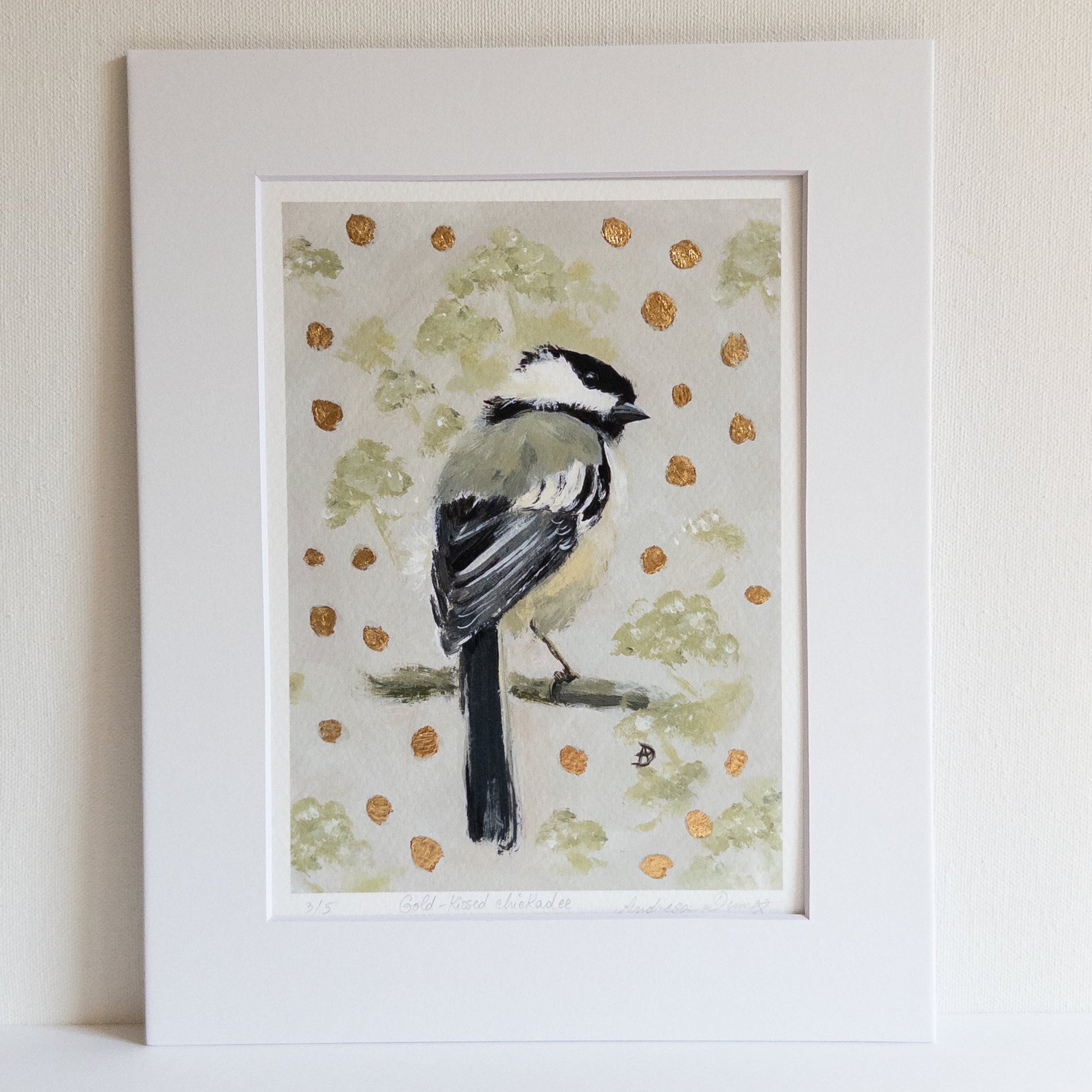 Framed artwork of a chickadee bird on a floral background