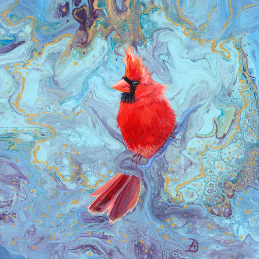 Red cardinal bird on an abstract, marbled blue and purple background