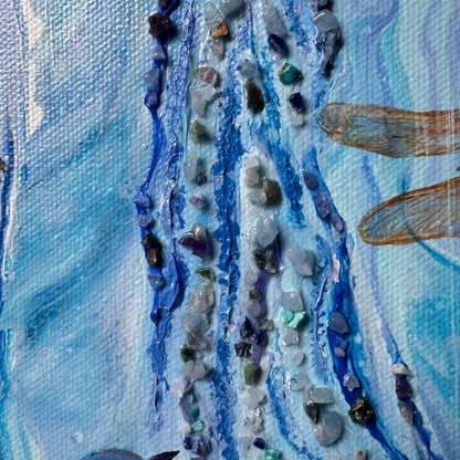 Artistic depiction of a river with stones and a dragonfly, using textured blue and earthy tones.