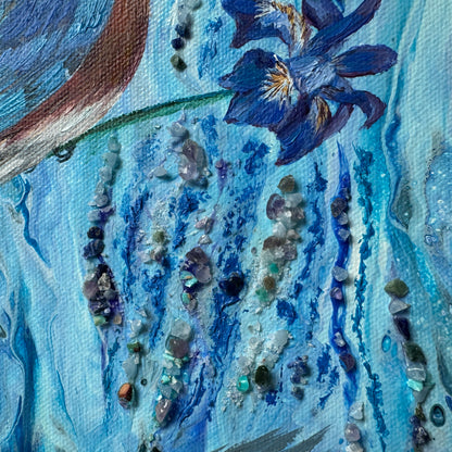 Close-up of a textured painting with blue tones