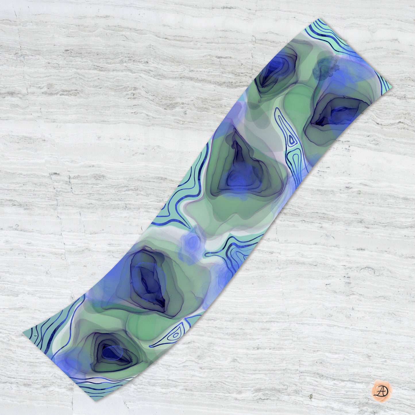 Colorful scarf with abstract peacock eye patterns on a white background. Unique silk scarf suitable for client appreciation gifts and luxury corporate gifts. 