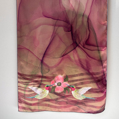 Silk scarf with hummingbirds and floral design on a white background