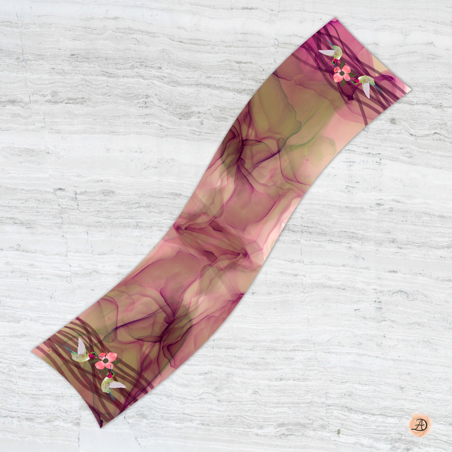 Silk Scarf with hummingbirds and floral design on a light wooden floor