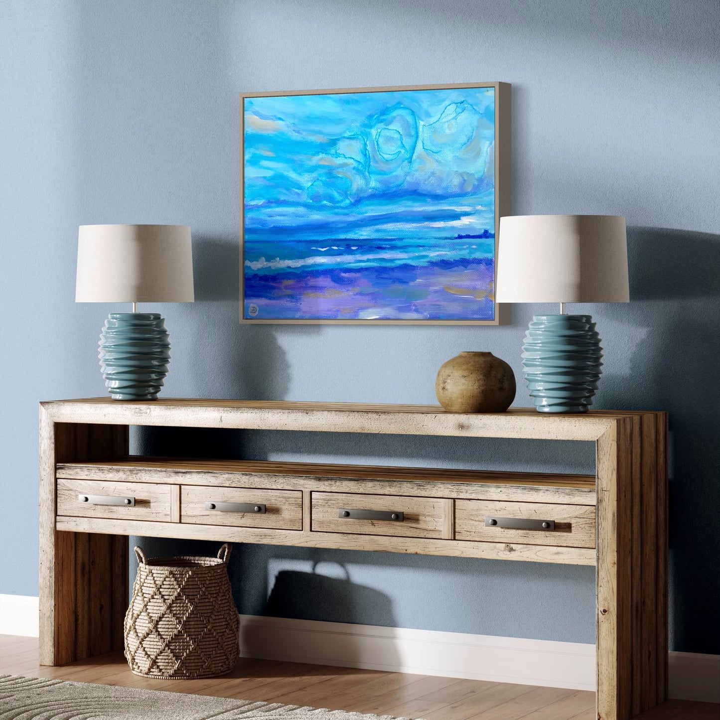 Room decor with Jenness Beach painting hanging on the wall