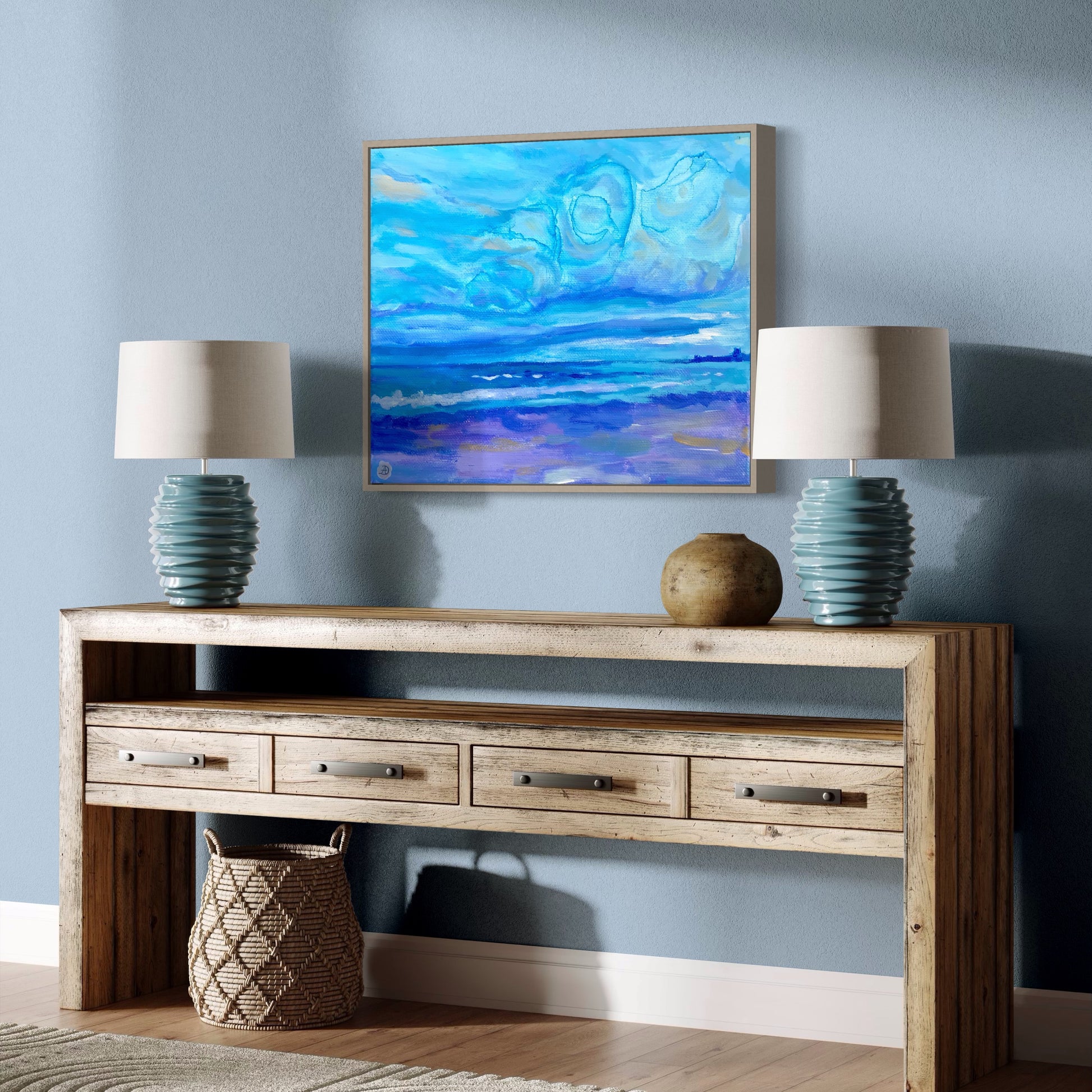 Room decor with Jenness Beach painting hanging on the wall