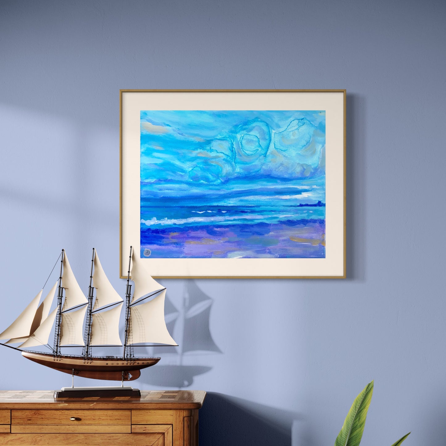 Interior coastal room with a small ship decoration and Jenness Beach painting by Andreea Dumez