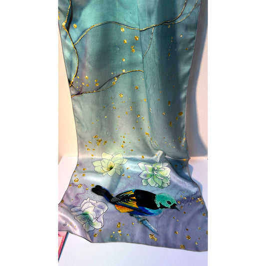 Blue silk scarf with floral and exotic tanager bird design on a white background. Unique silk scarf suitable for client appreciation gifts and luxury corporate gifts. 