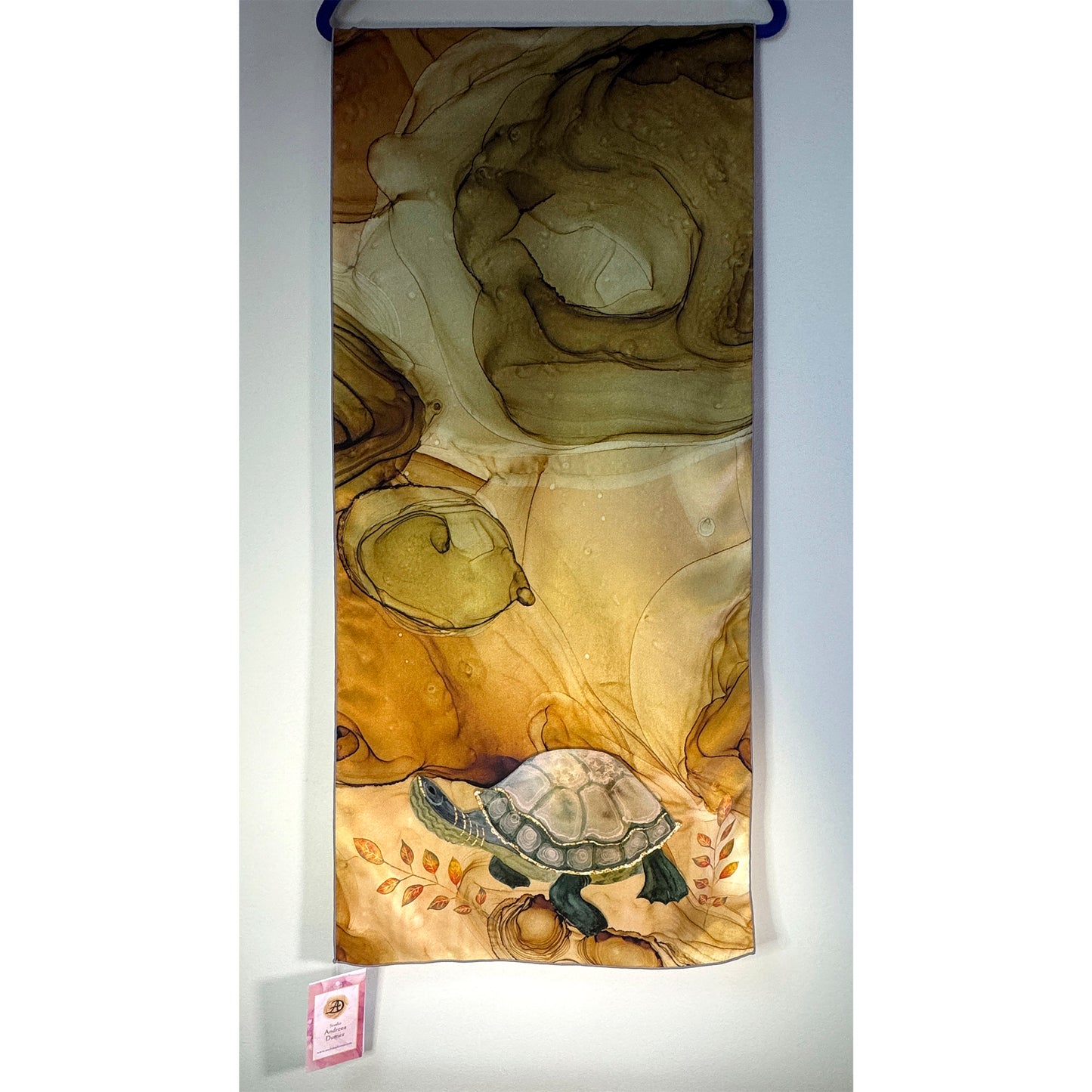 Decorative brown-green silk scarf with a turtle design on a white background. Unique silk scarf suitable for client appreciation gifts and luxury corporate gifts. 